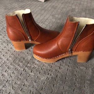 Sven wooden heel clog boot lined in shearling.